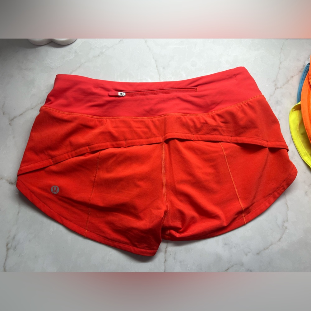 CARNATION RED LULULEMON SPEED UP LR SHORTS 2.5”